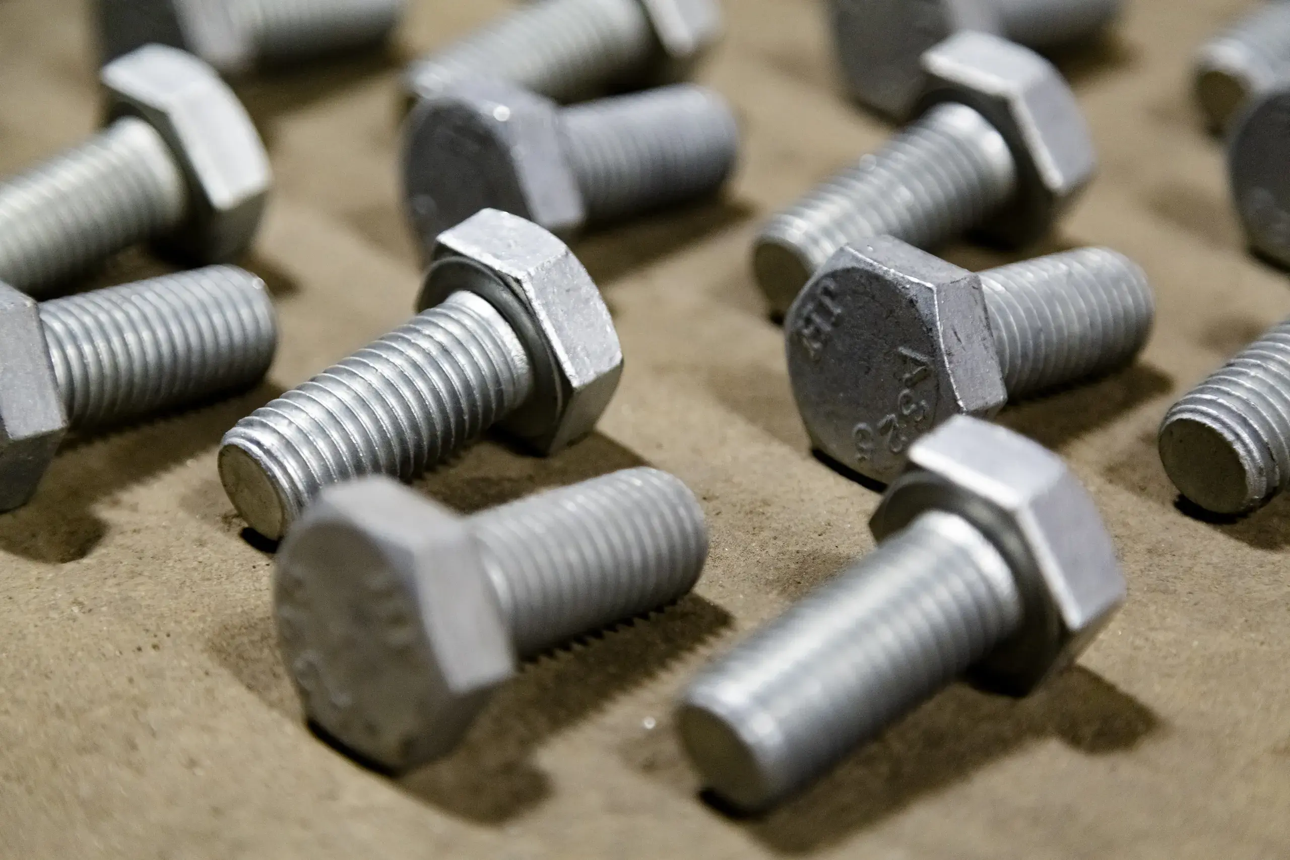 Close-up of galvanized A325 heavy hex structural bolts